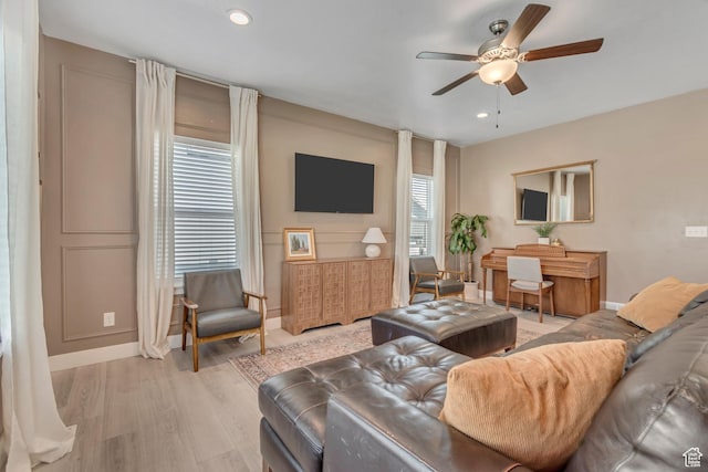 4913 E Golden Meadow Xing, Eagle Mountain, UT 84005 - living area featuring a ceiling fan, light wood finished floors, and recessed lighting