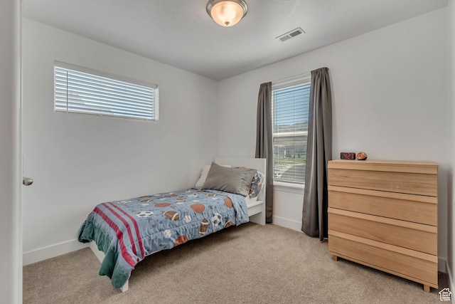 4913 E Golden Meadow Xing, Eagle Mountain, UT 84005 - bedroom with multiple windows and light carpet