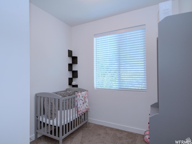 1690 S 225 W, Clearfield, UT 84015 - carpeted bedroom featuring baseboards and a nursery area
