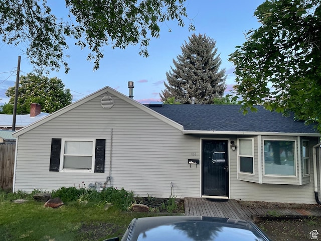 484 N 300 W, Logan, UT 84321 - view of front of home featuring a shingled roof and a wooden deck