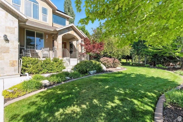 9116 Silver Lake Dr, Cedar Hills, UT 84062 - view of green lawn featuring a porch