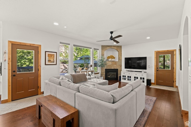 9116 Silver Lake Dr, Cedar Hills, UT 84062 - living area with a tile fireplace, dark wood-style flooring, a ceiling fan, and recessed lighting