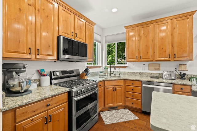 9116 Silver Lake Dr, Cedar Hills, UT 84062 - kitchen with stainless steel appliances, dark wood finished floors, light stone counters, and recessed lighting
