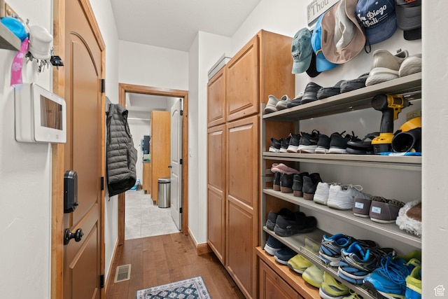 9116 Silver Lake Dr, Cedar Hills, UT 84062 - spacious closet with dark wood-style flooring