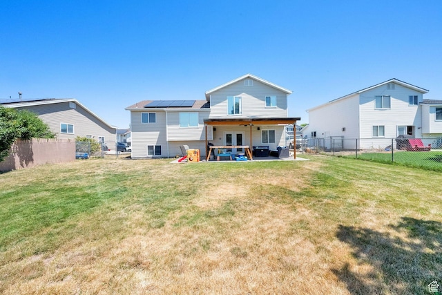 1609 N 2275 W, Clinton, UT 84015 - rear view of house featuring french doors, a patio area, a fenced backyard, and outdoor lounge area