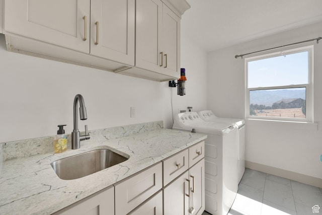 2423 W Cedarline Loop, Stockton, UT 84071 - laundry area with cabinet space, separate washer and dryer, and light marble finish floors