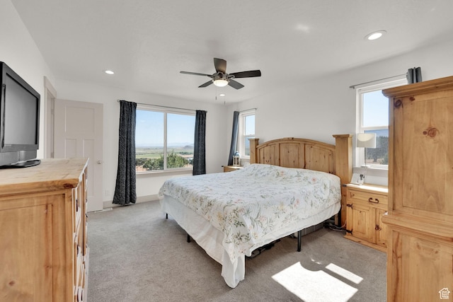 2423 W Cedarline Loop, Stockton, UT 84071 - bedroom with multiple windows, light colored carpet, recessed lighting, and a ceiling fan
