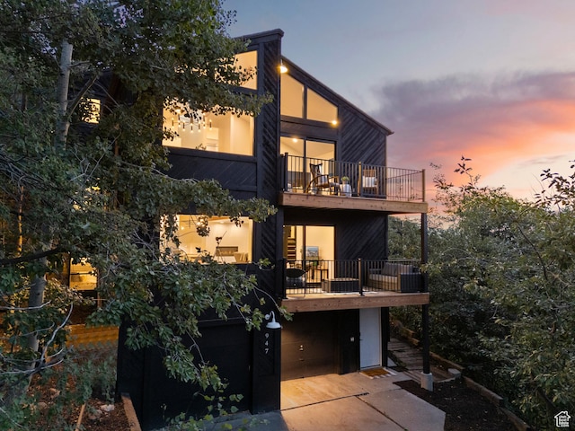947 Northstar Dr, Park City, UT 84060 - back of property with a balcony, driveway, and a garage