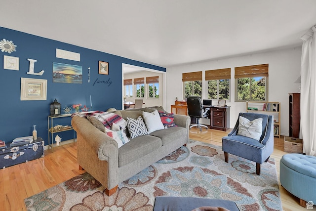 4445 Fillmore Ave, Ogden, UT 84403 - living area with wood finished floors and a desk