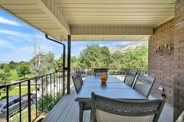 4445 Fillmore Ave, Ogden, UT 84403 - wooden terrace with a mountain view and view of wooded area
