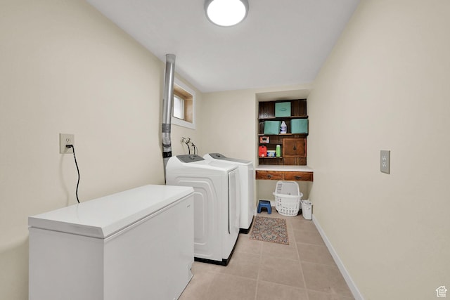 4445 Fillmore Ave, Ogden, UT 84403 - laundry room with separate washer and dryer and light tile patterned flooring