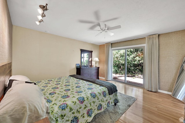 4445 Fillmore Ave, Ogden, UT 84403 - bedroom with access to exterior, wood finished floors, and ceiling fan