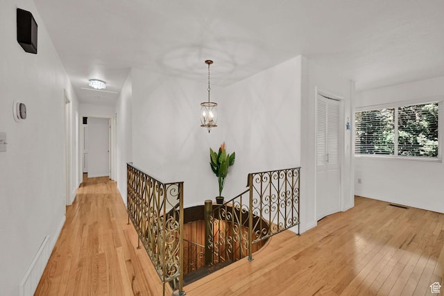 4445 Fillmore Ave, Ogden, UT 84403 - hall featuring an upstairs landing and hardwood / wood-style flooring