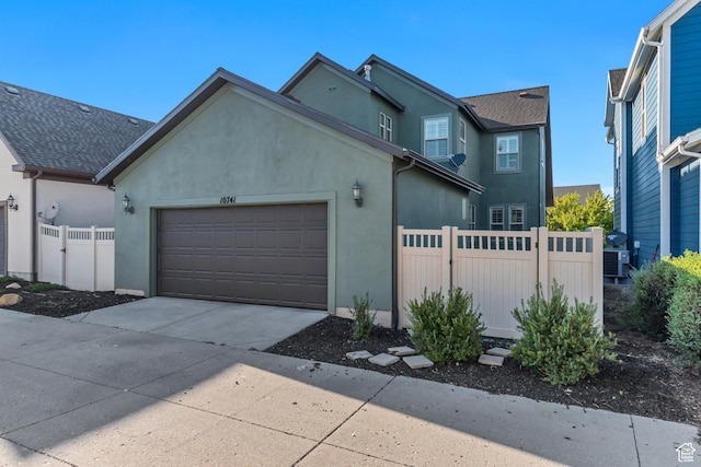10741 S Topview Rd, South Jordan, UT 84095 - traditional-style home with stucco siding, driveway, and an attached garage