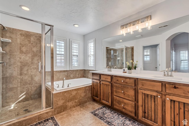 10741 S Topview Rd, South Jordan, UT 84095 - bathroom featuring a shower stall, double vanity, a garden tub, tile patterned floors, and recessed lighting