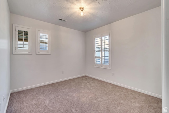 10741 S Topview Rd, South Jordan, UT 84095 - carpeted empty room with healthy amount of natural light and a textured ceiling