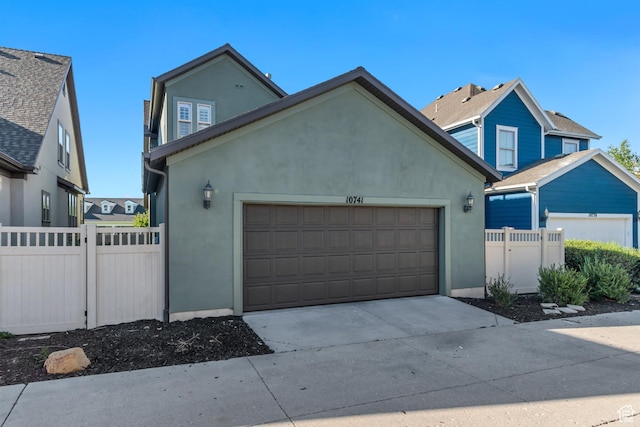 10741 S Topview Rd, South Jordan, UT 84095 - traditional home featuring stucco siding, an attached garage, and concrete driveway