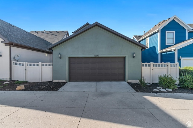 10741 S Topview Rd, South Jordan, UT 84095 - view of front of property featuring stucco siding, concrete driveway, and a garage