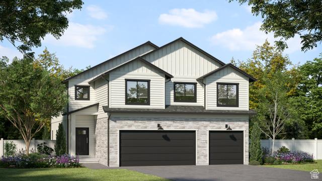 165 S 2800 E Unit 102, Spanish Fork, UT 84660 - view of front of house featuring board and batten siding, a garage, asphalt driveway, and stone siding