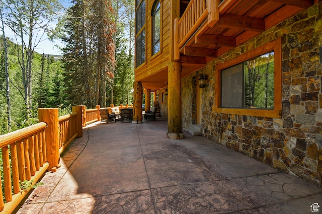 8581 Shingle Mill Dr, Oakley, UT 84055 - view of patio featuring a forest view