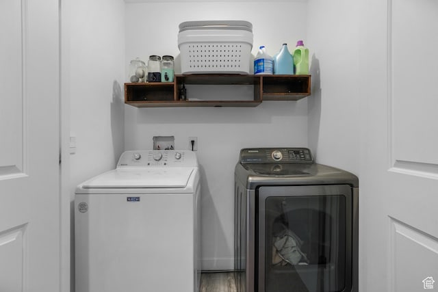 8466 W Cordero Dr S, Magna, UT 84044 - laundry area featuring independent washer and dryer and wood finished floors