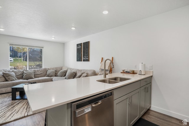 8466 W Cordero Dr S, Magna, UT 84044 - kitchen with dishwasher, open floor plan, light countertops, light wood-style flooring, and recessed lighting