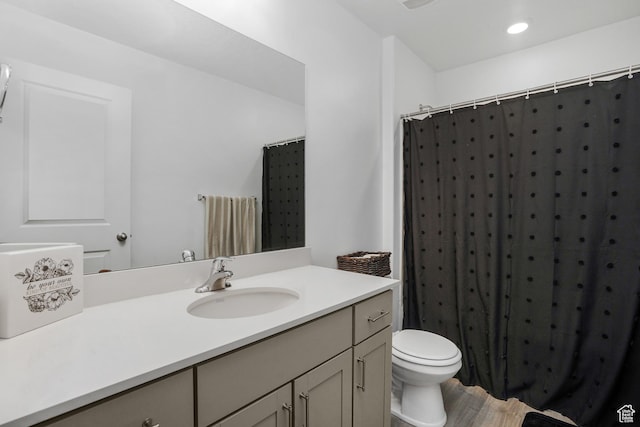8466 W Cordero Dr S, Magna, UT 84044 - full bath featuring vanity, wood finished floors, a shower with shower curtain, and recessed lighting