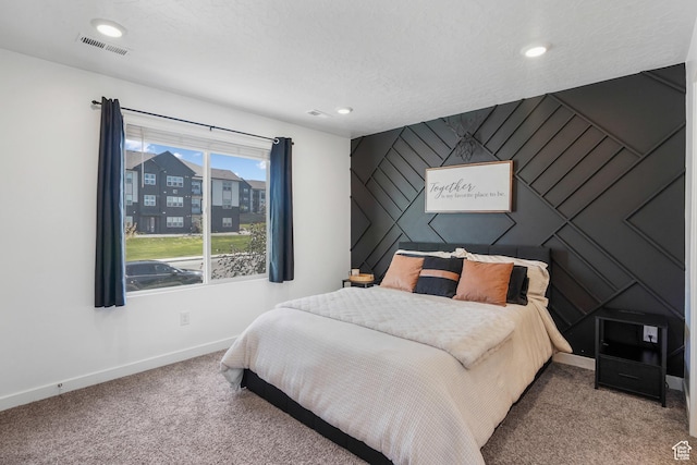 8466 W Cordero Dr S, Magna, UT 84044 - carpeted bedroom featuring an accent wall and recessed lighting