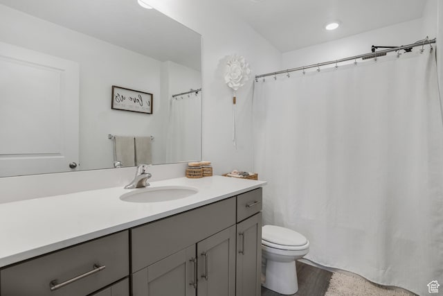 8466 W Cordero Dr S, Magna, UT 84044 - full bathroom with vanity, a shower with shower curtain, and wood finished floors
