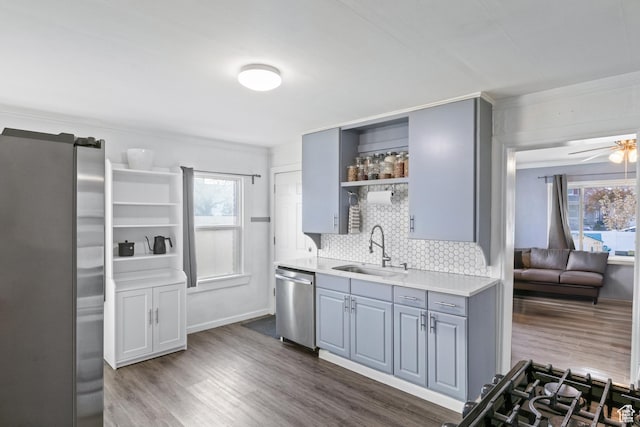 461 S 400 W, Provo, UT 84601 - kitchen featuring stainless steel appliances, open shelves, gray cabinetry, ornamental molding, and light countertops