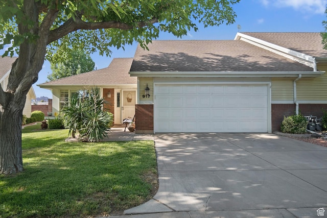 845 N Valley View Dr Unit 917, St George, UT 84770 - ranch-style home with an attached garage, concrete driveway, a front lawn, and brick siding