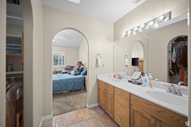 845 N Valley View Dr Unit 917, St George, UT 84770 - full bathroom featuring ensuite bath, double vanity, tile patterned flooring, and a spacious closet
