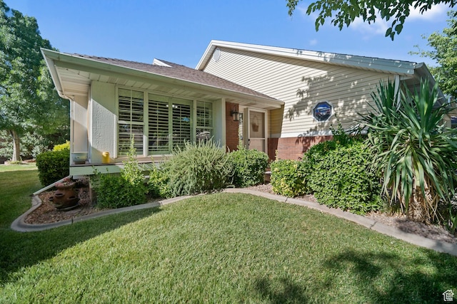 845 N Valley View Dr Unit 917, St George, UT 84770 - view of front of house featuring a front lawn and brick siding