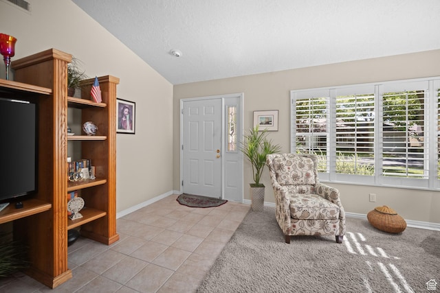 845 N Valley View Dr Unit 917, St George, UT 84770 - foyer entrance with vaulted ceiling, light tile patterned floors, and light colored carpet