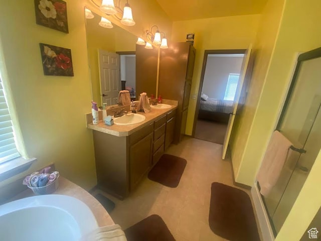 6689 W 7625 S, Myton, UT 84052 - ensuite bathroom with double vanity, a bath, and a shower with door