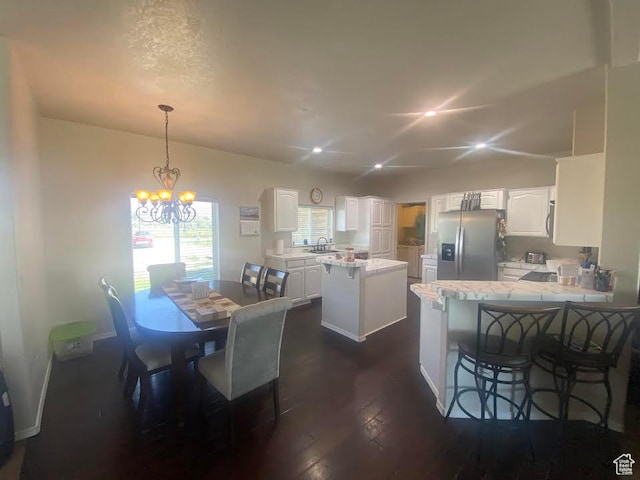 6689 W 7625 S, Myton, UT 84052 - dining room with a chandelier, dark wood-type flooring, and recessed lighting