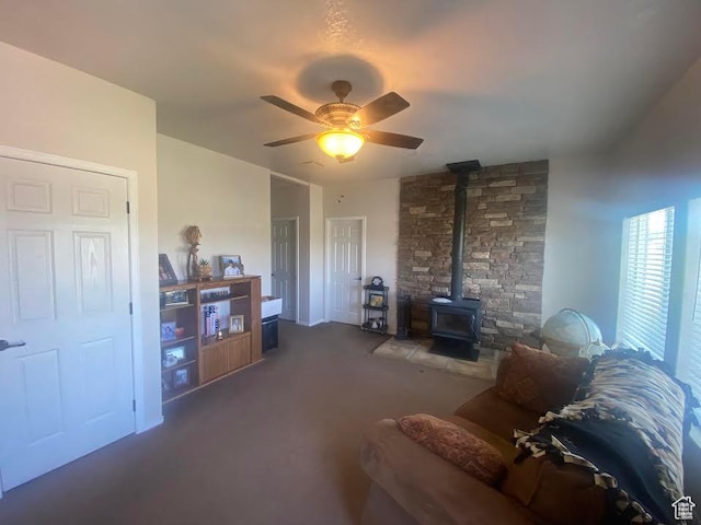 6689 W 7625 S, Myton, UT 84052 - carpeted living area with a wood stove and ceiling fan