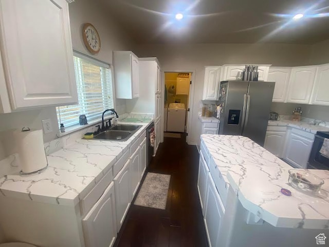 6689 W 7625 S, Myton, UT 84052 - kitchen featuring stainless steel appliances, white cabinetry, washer / clothes dryer, dark wood-style floors, and light stone countertops