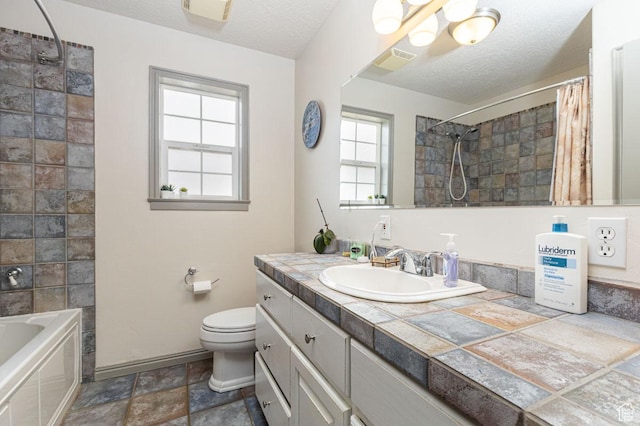 1444 N 3775 W, Cedar City, UT 84721 - full bath with vanity, a textured ceiling, stone finish floors, and shower / tub combo