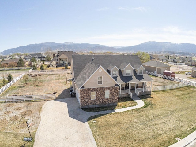 1444 N 3775 W, Cedar City, UT 84721 - view of front of house featuring covered porch, a mountain view, and stone siding