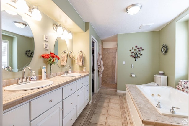 1444 N 3775 W, Cedar City, UT 84721 - full bath with a tub with jets, double vanity, a stall shower, and tile patterned floors