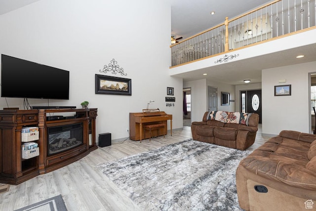 1444 N 3775 W, Cedar City, UT 84721 - living room featuring ceiling fan, wood finished floors, a towering ceiling, and recessed lighting