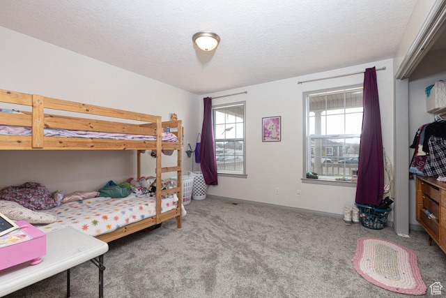 1444 N 3775 W, Cedar City, UT 84721 - carpeted bedroom featuring a textured ceiling and baseboards