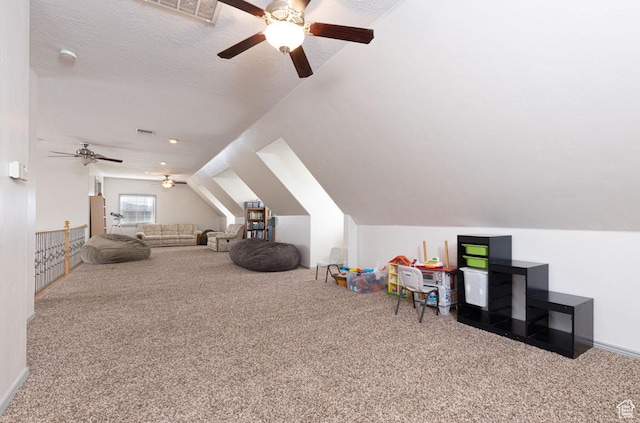 1444 N 3775 W, Cedar City, UT 84721 - recreation room featuring carpet floors, ceiling fan, vaulted ceiling, and a textured ceiling