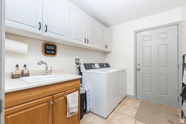 1444 N 3775 W, Cedar City, UT 84721 - laundry room with cabinet space, separate washer and dryer, and light tile patterned floors