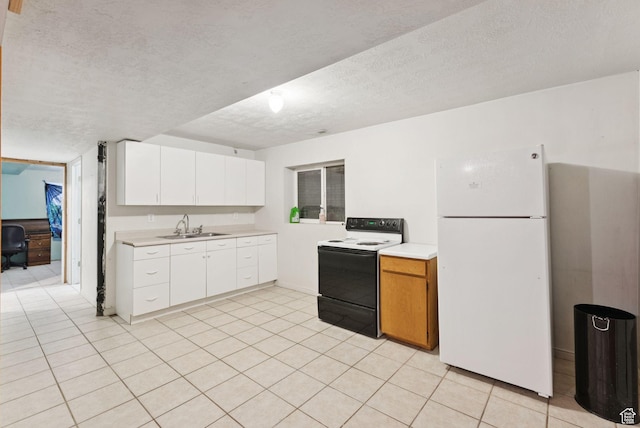 2970 W Shadow Park Dr, West Valley City, UT 84119 - kitchen featuring electric range, freestanding refrigerator, light countertops, a textured ceiling, and light tile patterned floors