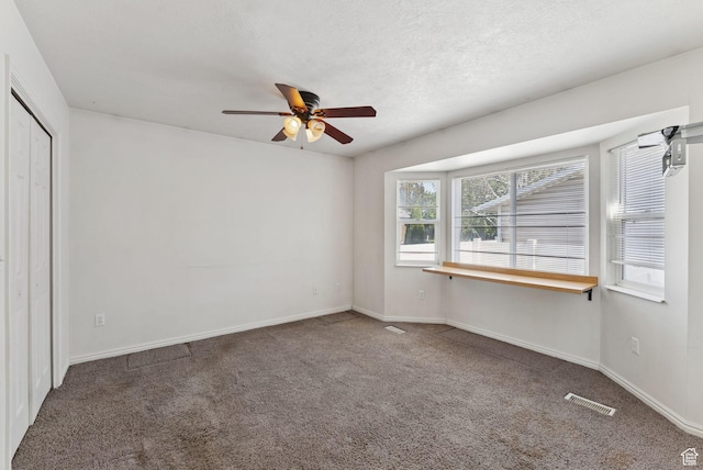 2970 W Shadow Park Dr, West Valley City, UT 84119 - unfurnished bedroom featuring carpet floors, a closet, and ceiling fan