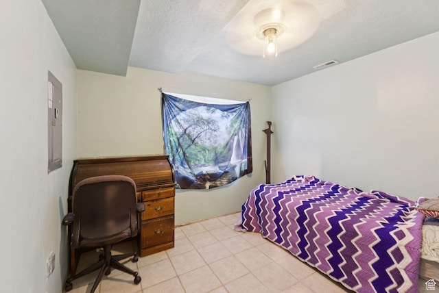 2970 W Shadow Park Dr, West Valley City, UT 84119 - bedroom featuring light tile patterned floors, electric panel, ceiling fan, and a textured ceiling