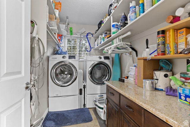 763 W 100 N, Hurricane, UT 84737 - laundry area featuring separate washer and dryer, a textured ceiling, and light tile patterned floors