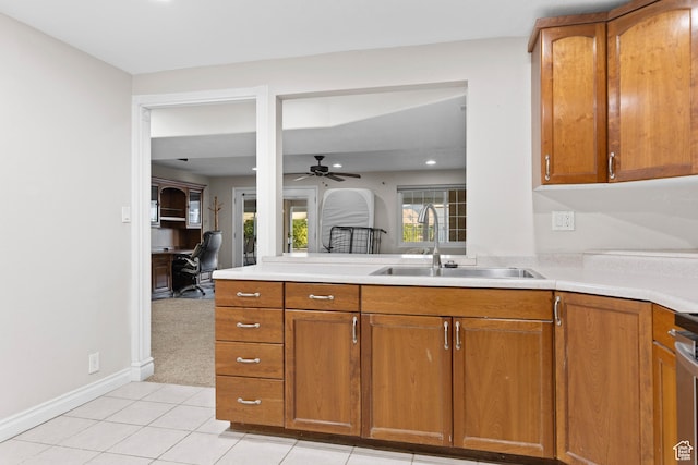 763 W 100 N, Hurricane, UT 84737 - kitchen featuring ceiling fan, a desk, brown cabinetry, and light tile patterned floors